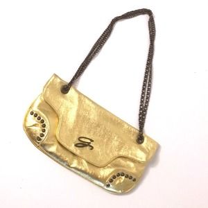 Guess collab Vera Pelle made Italy golden clutch